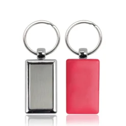 Gift Campaign Portachiavi rettangolare con lato in plastica colorata e 1 in metallo></noscript> Portachiavi In Metallo