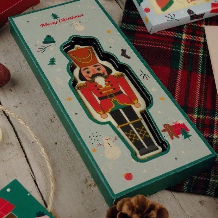 Gift Campaign Tavoletta di cioccolato a forma di schiaccianoci da 65g> Cioccolatini